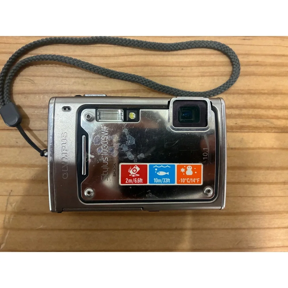 Olympus Stylus 1030 SW 10.1 MP Digital Camera Silver 3.6x Optical Wide Zoom
